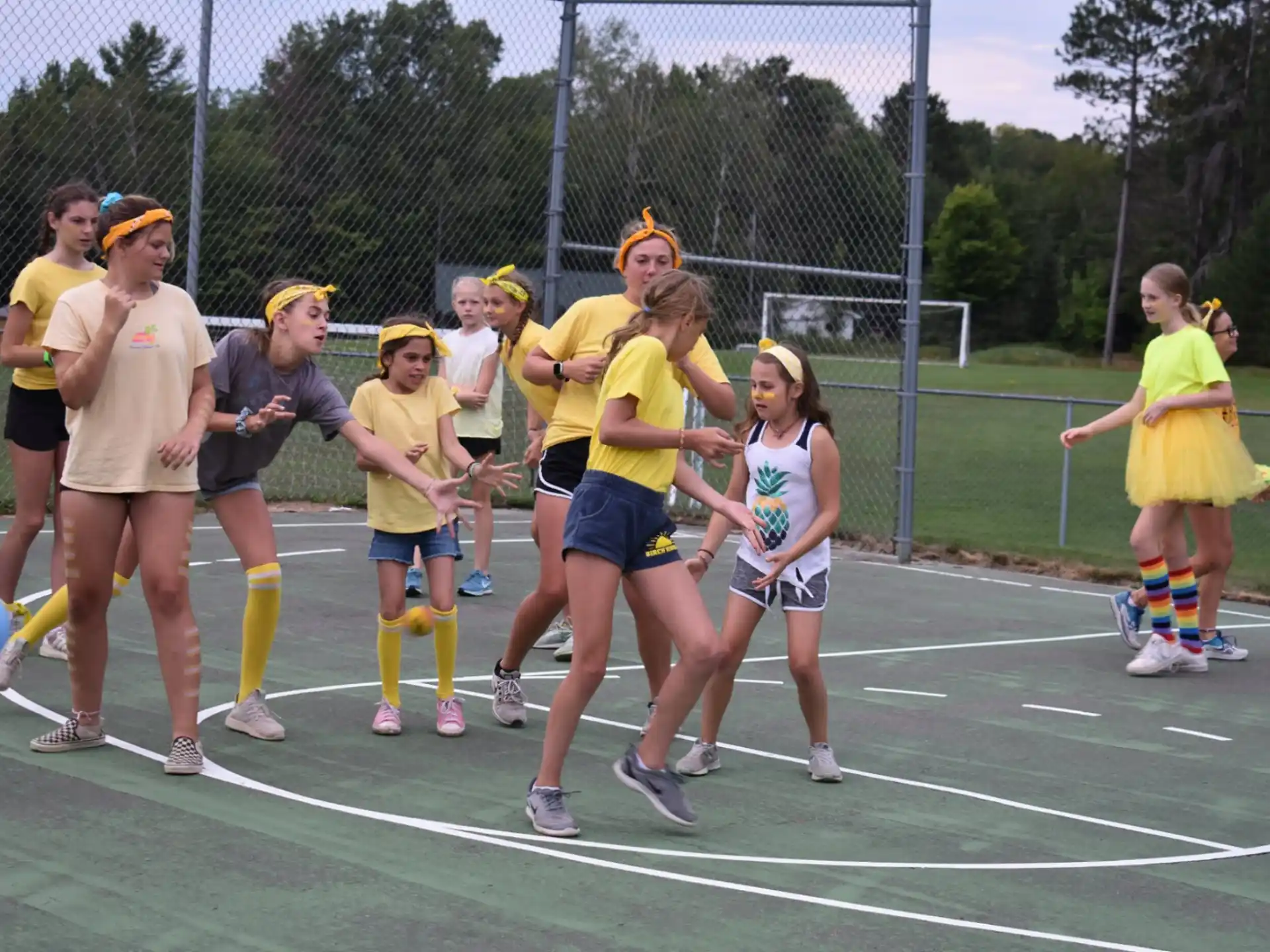 a group of people running on a track