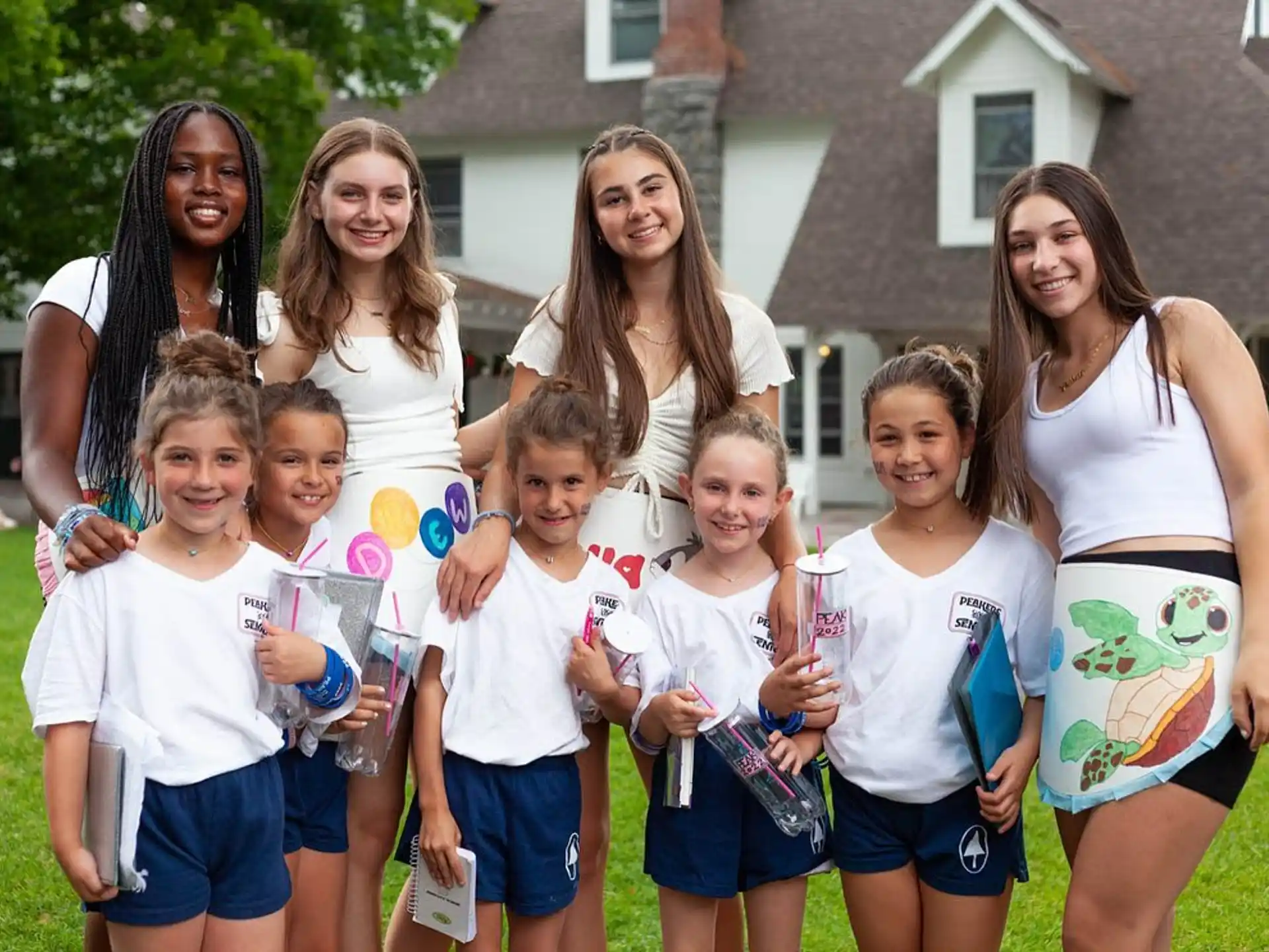 a group of girls posing for a photo