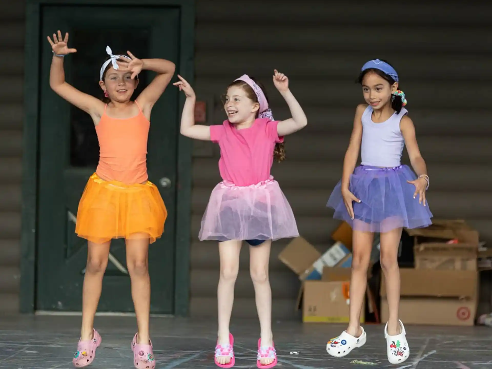 a group of girls wearing clothing