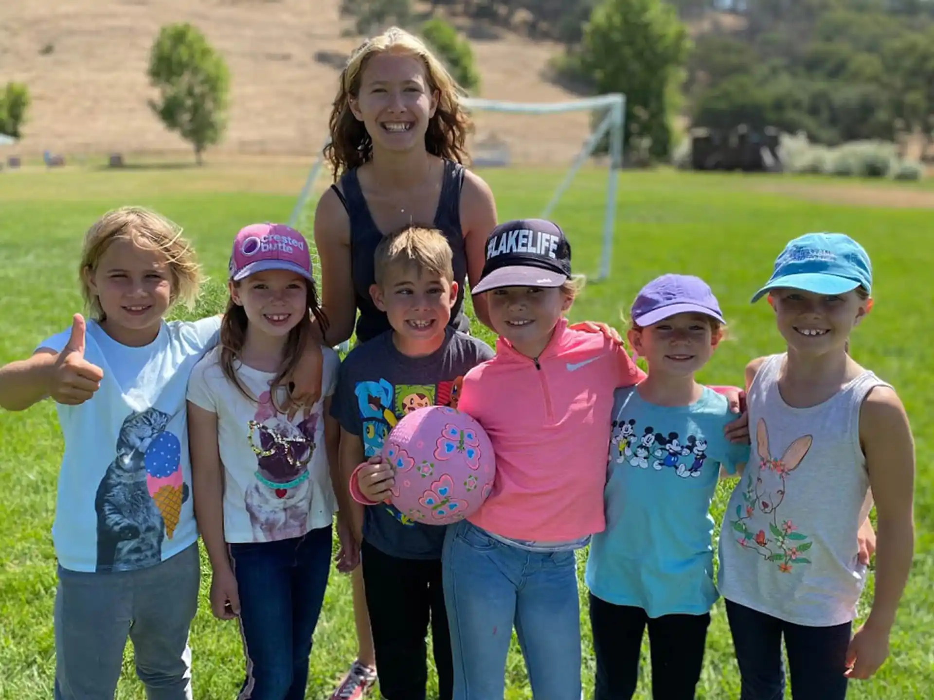 a group of children posing for a photo