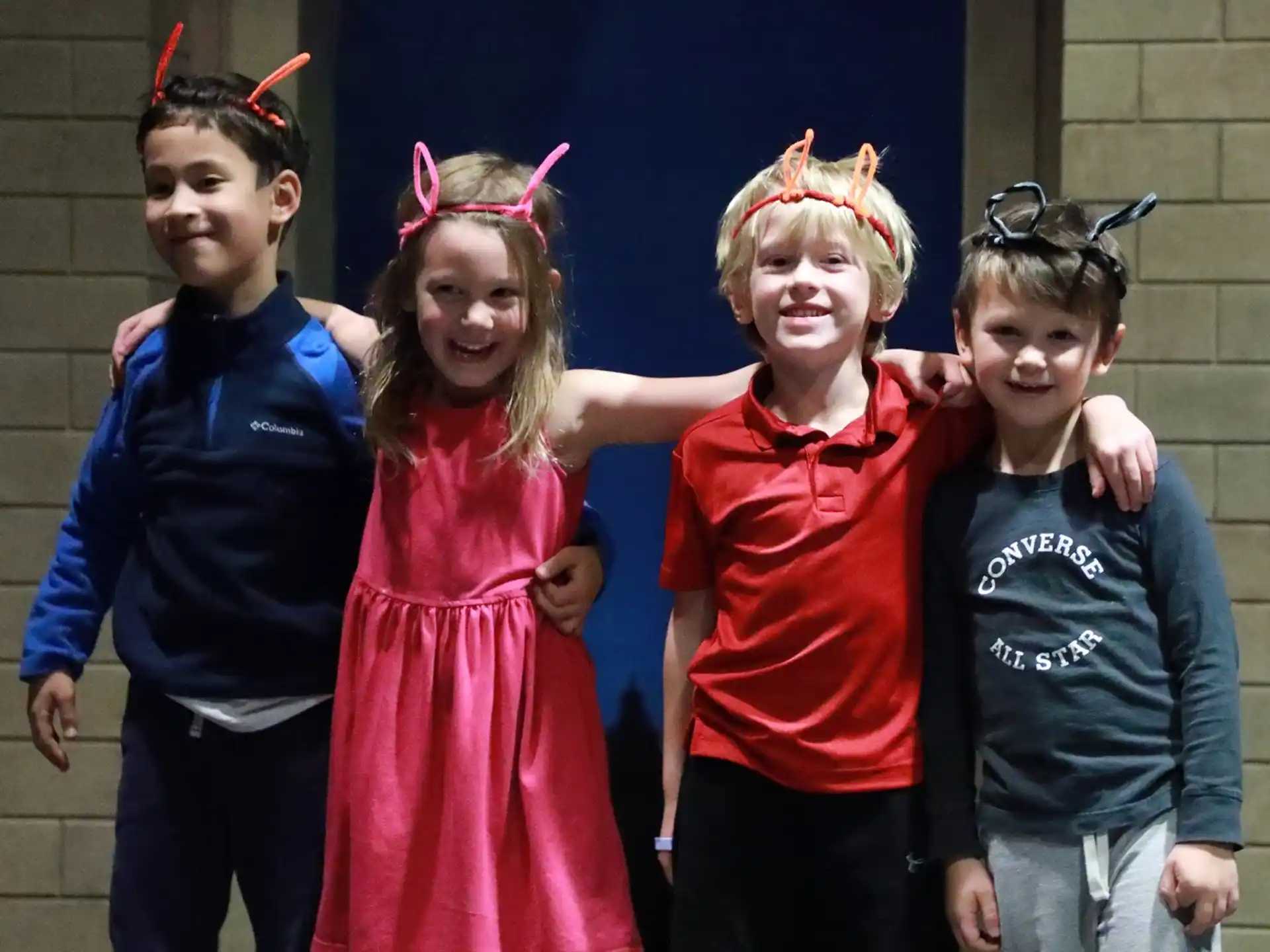 a group of children posing for a photo