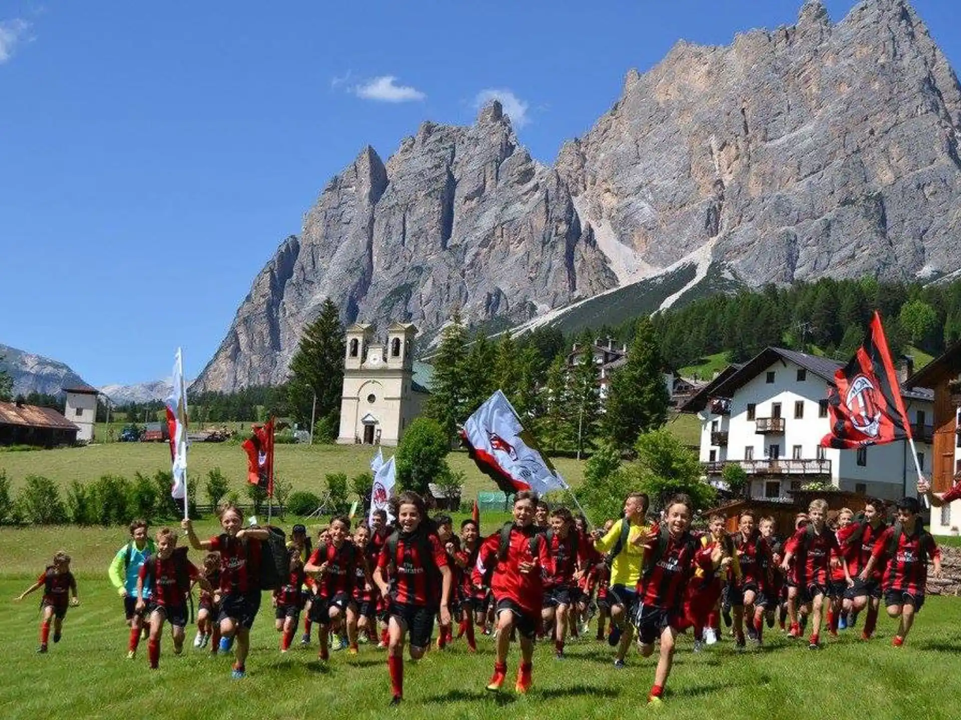a group of people in uniform running