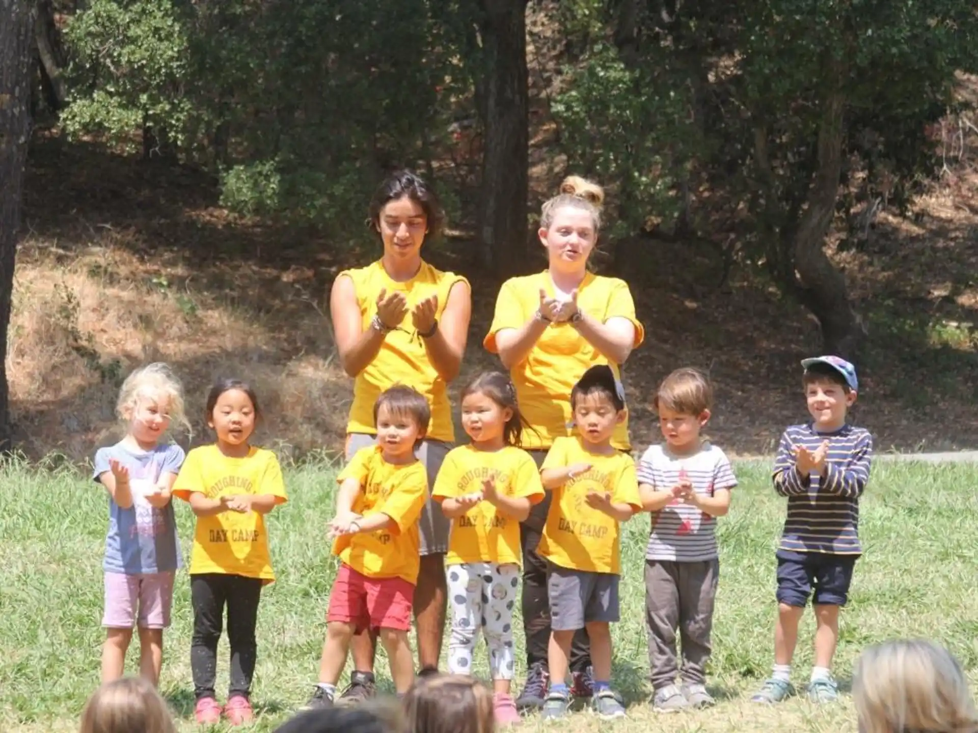 a group of children posing for a photo