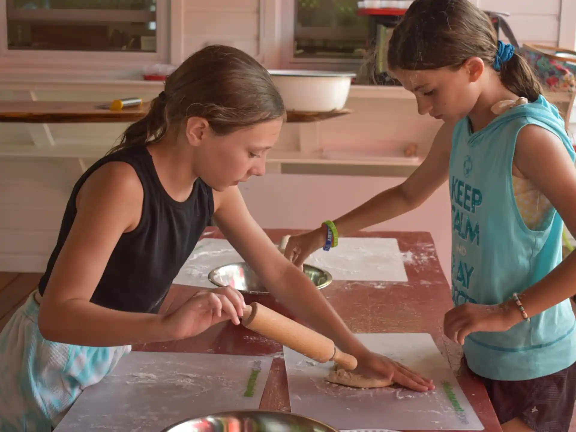a few young girls working on a project