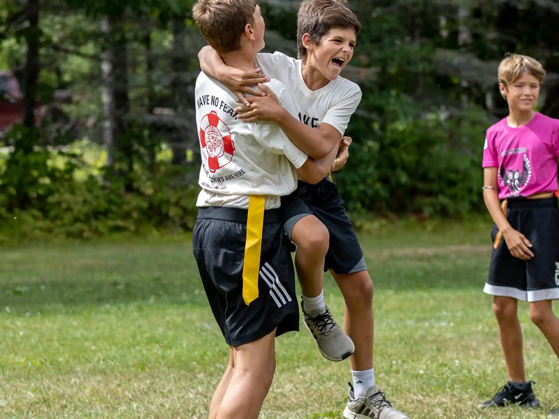 a group of boys playing football