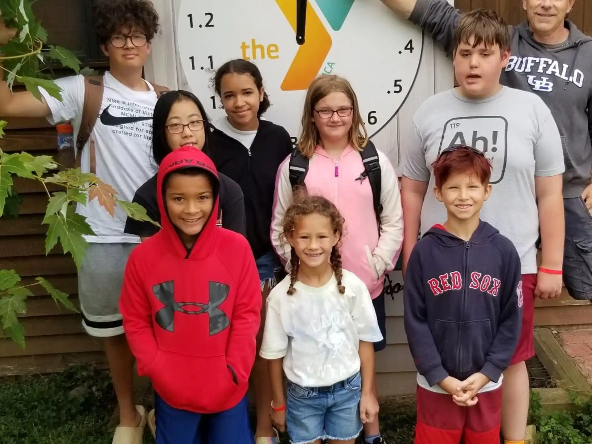 a group of people posing for a photo