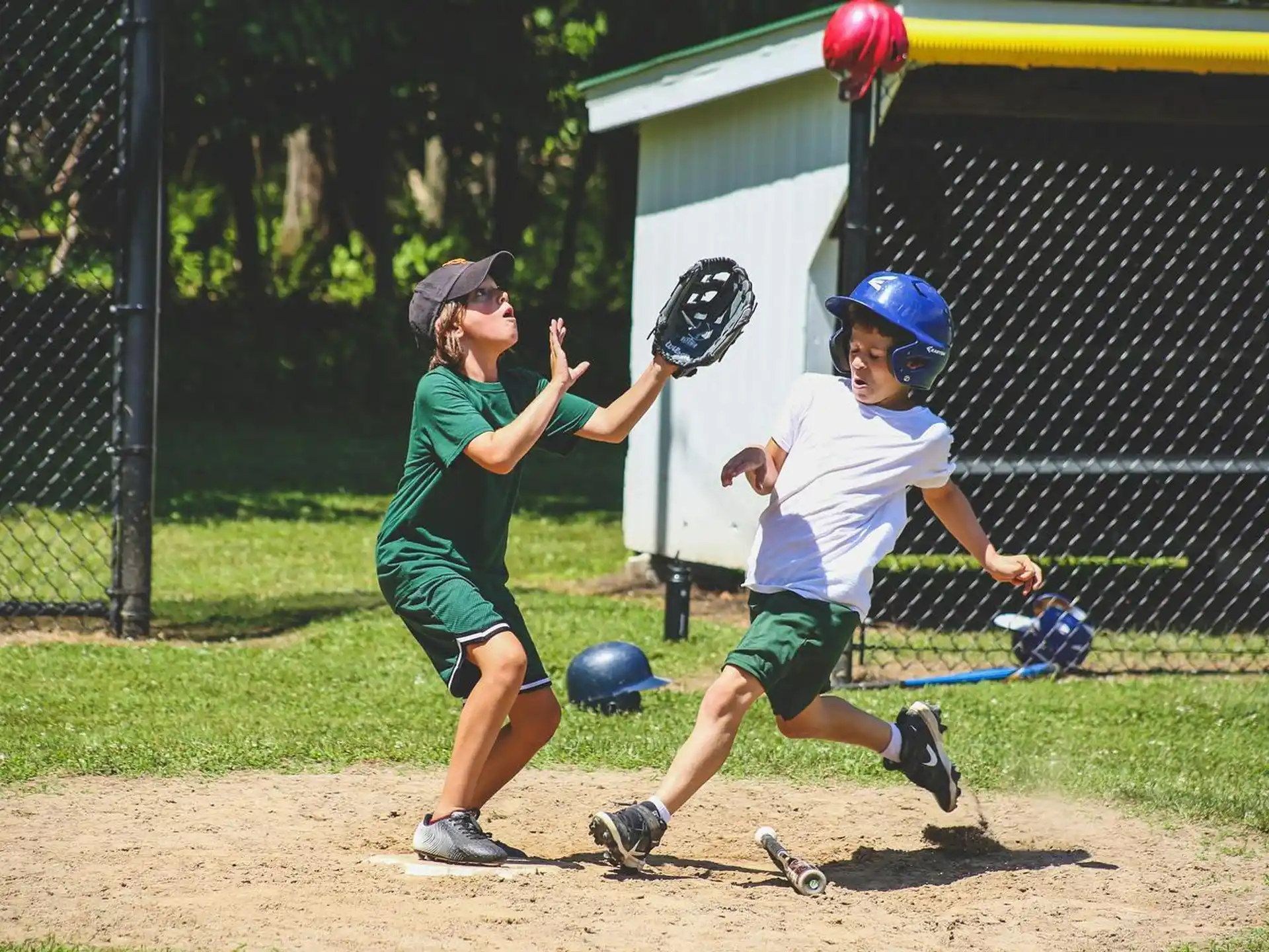 a couple of kids playing baseball