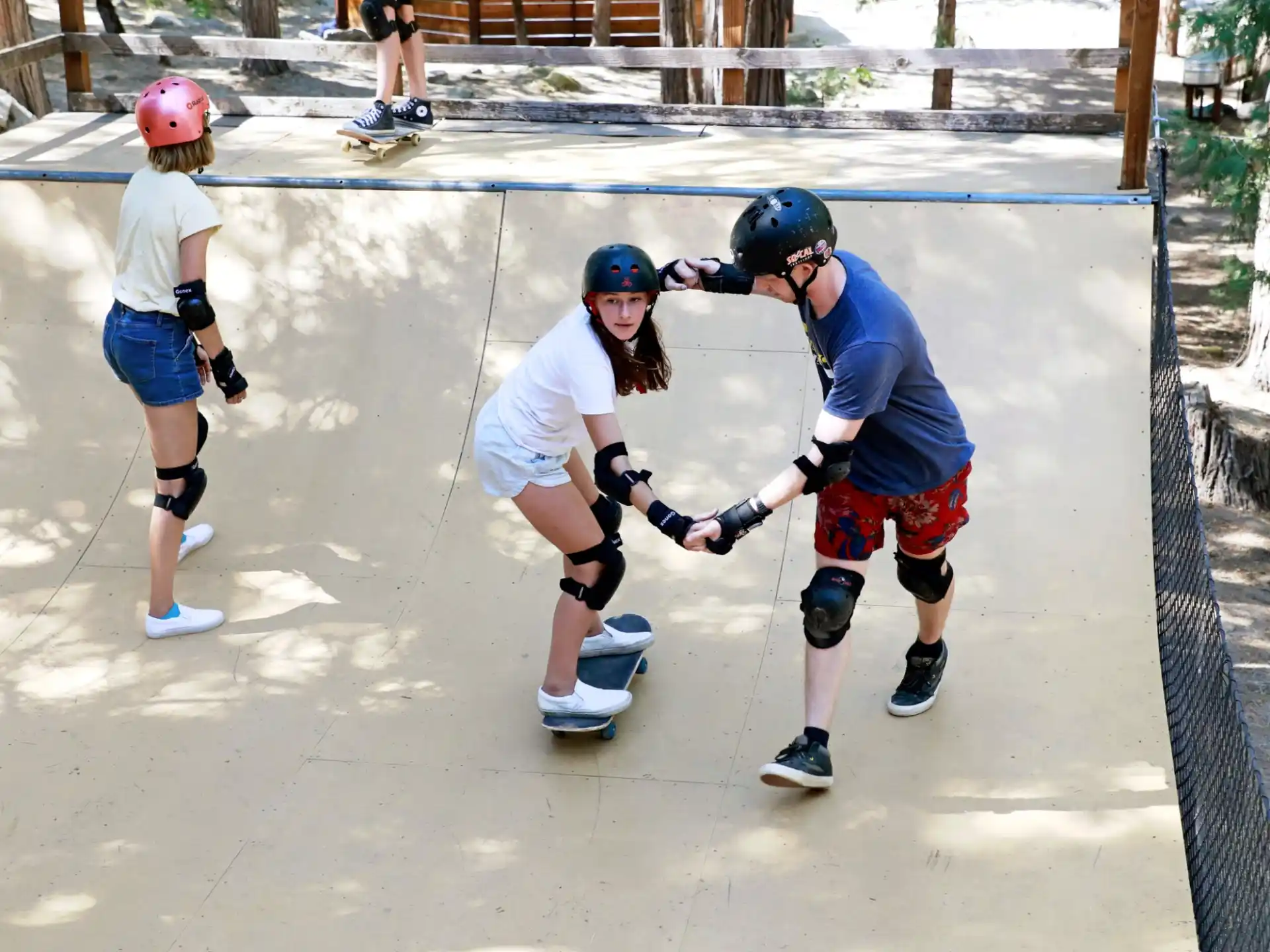 a group of people rollerblading