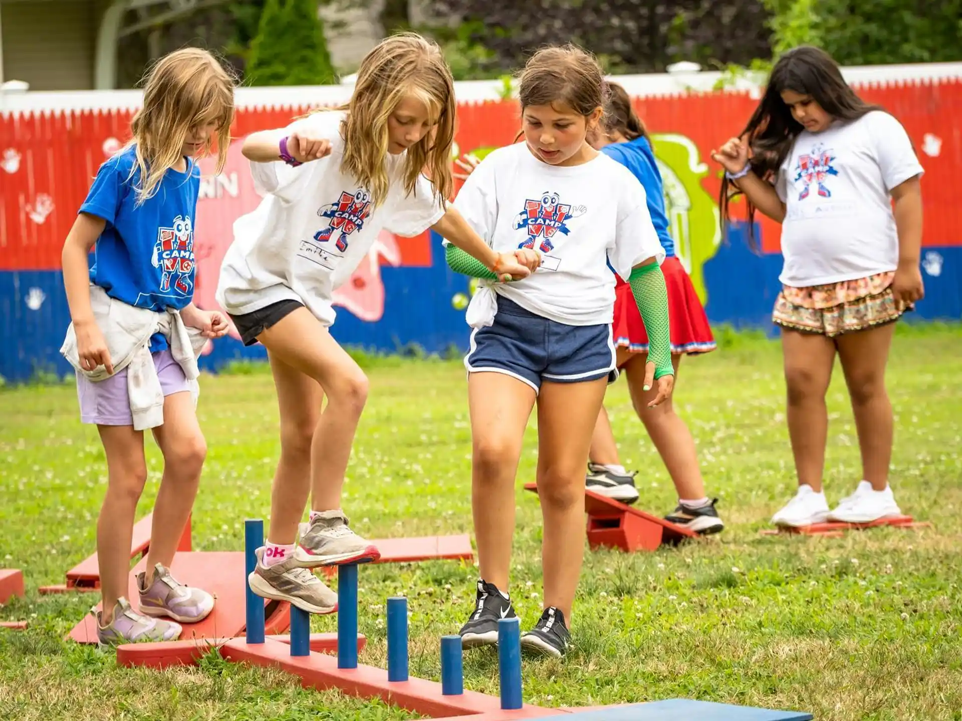 a group of girls playing on a playground