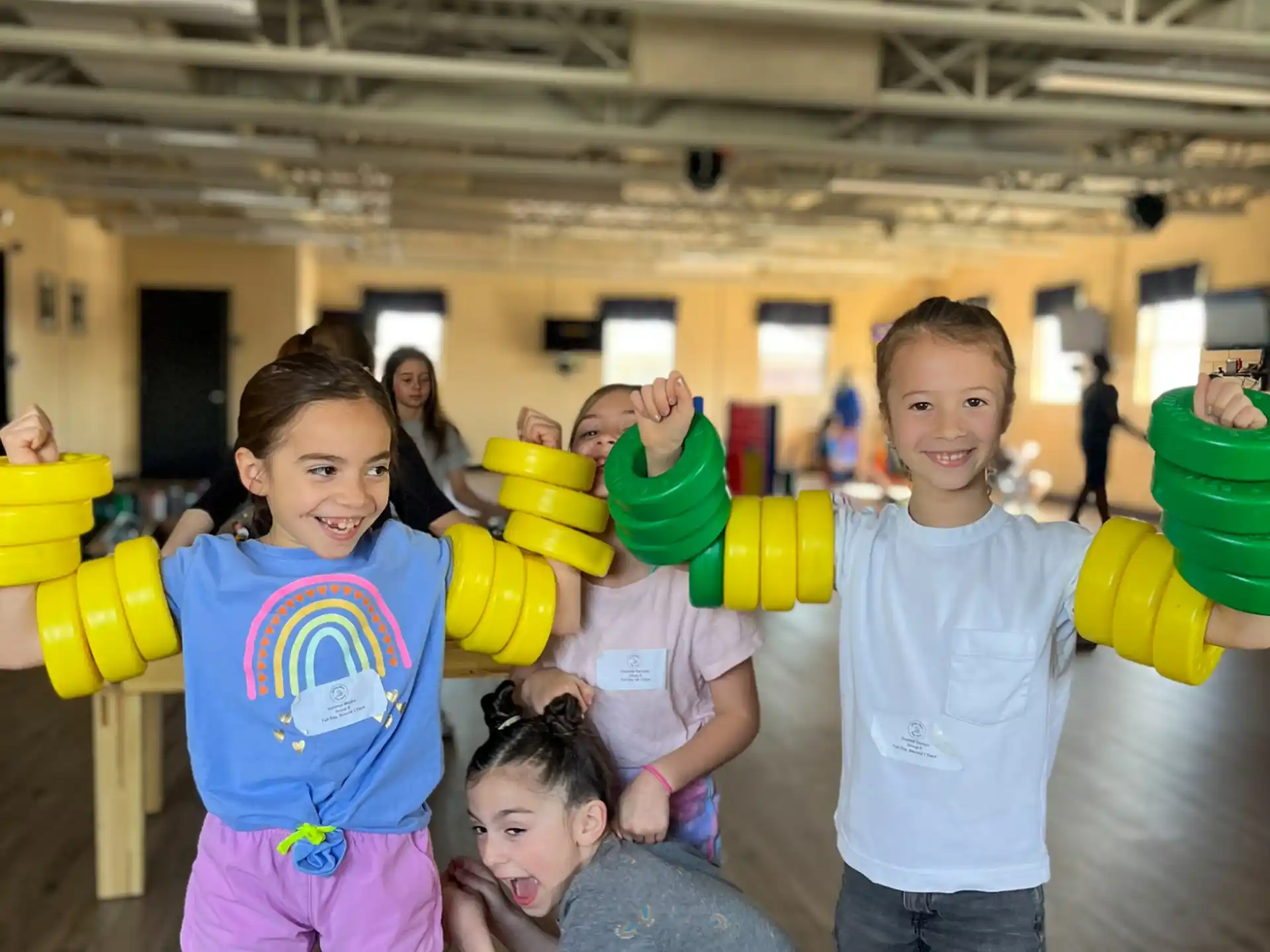 a group of kids playing with toys