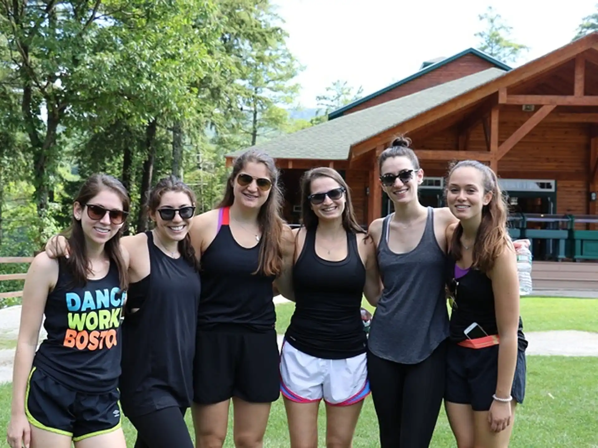 a group of women posing for a photo