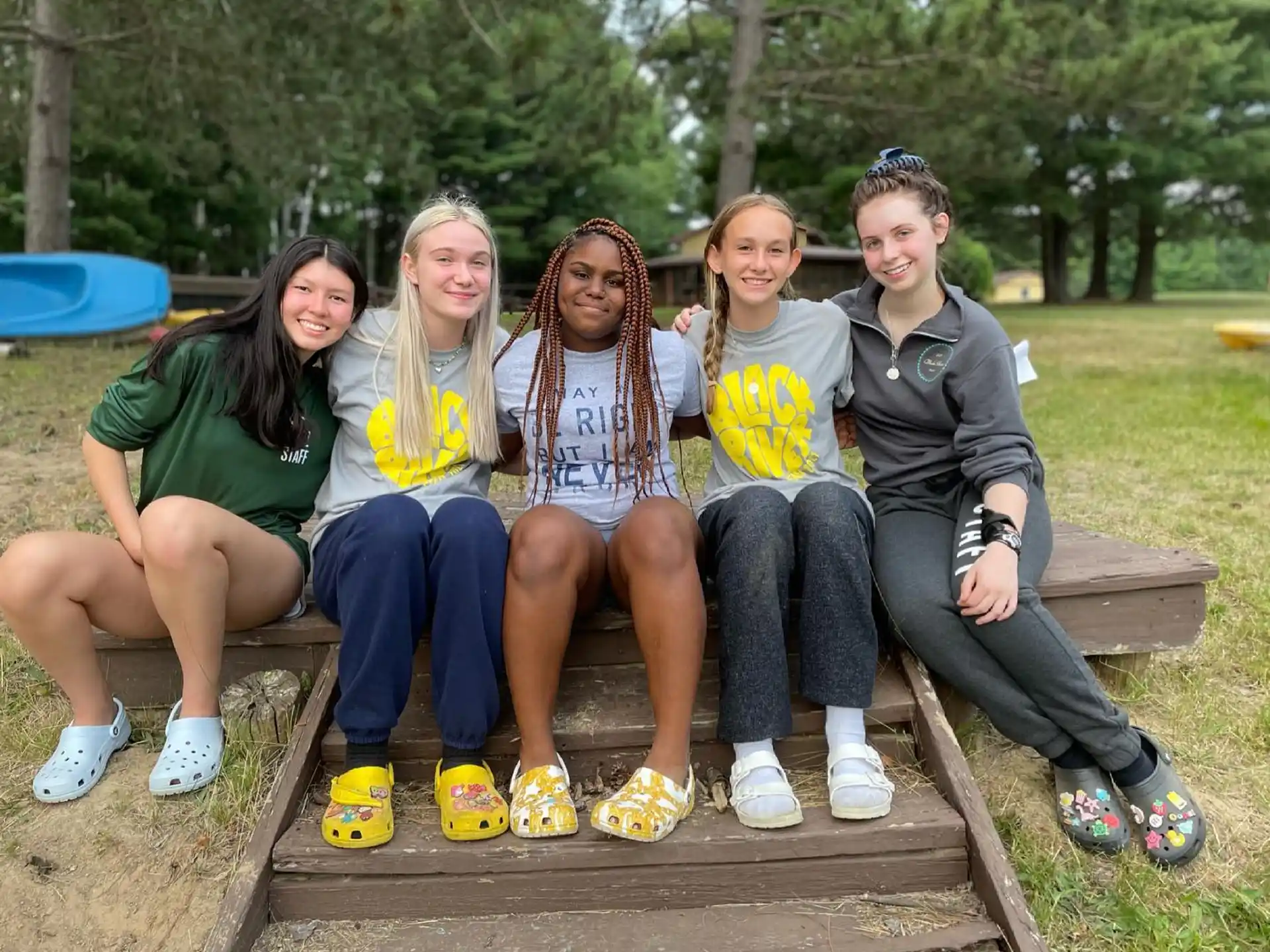 a group of people sitting on a bench