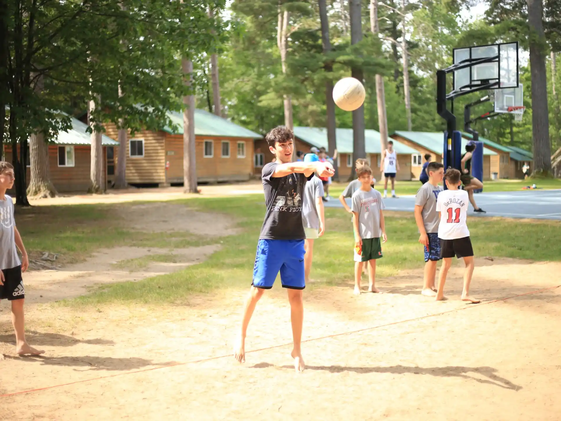 a group of people playing with a ball