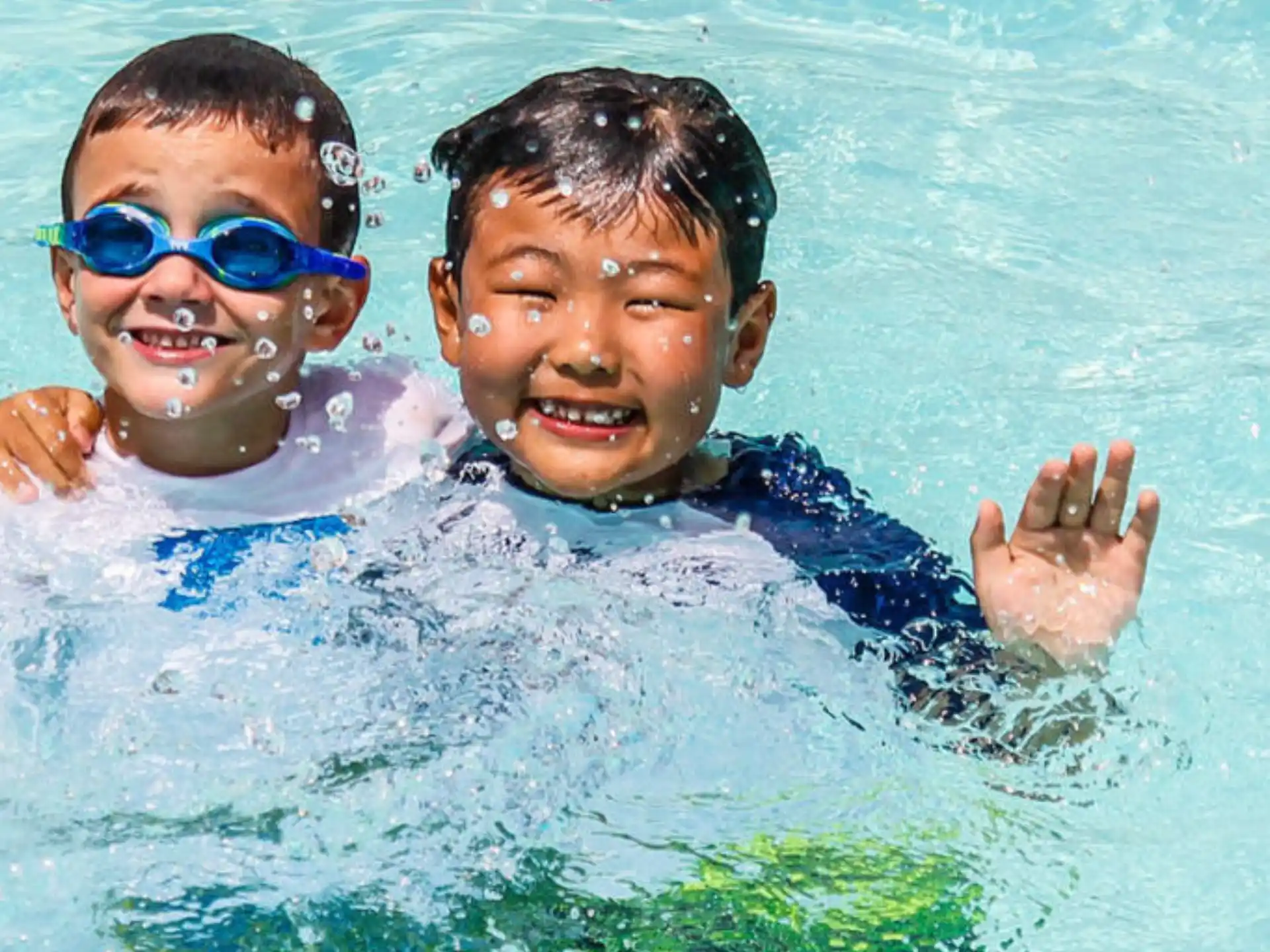 two boys in a pool